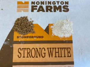 Turning_wheat_in_to_flour_in_our_mill