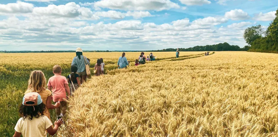 kids-walking-thought-wheat